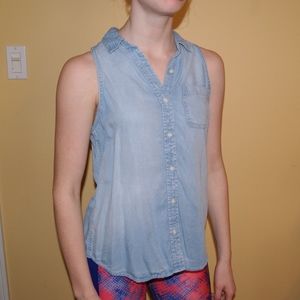 Blue, button up shirt.